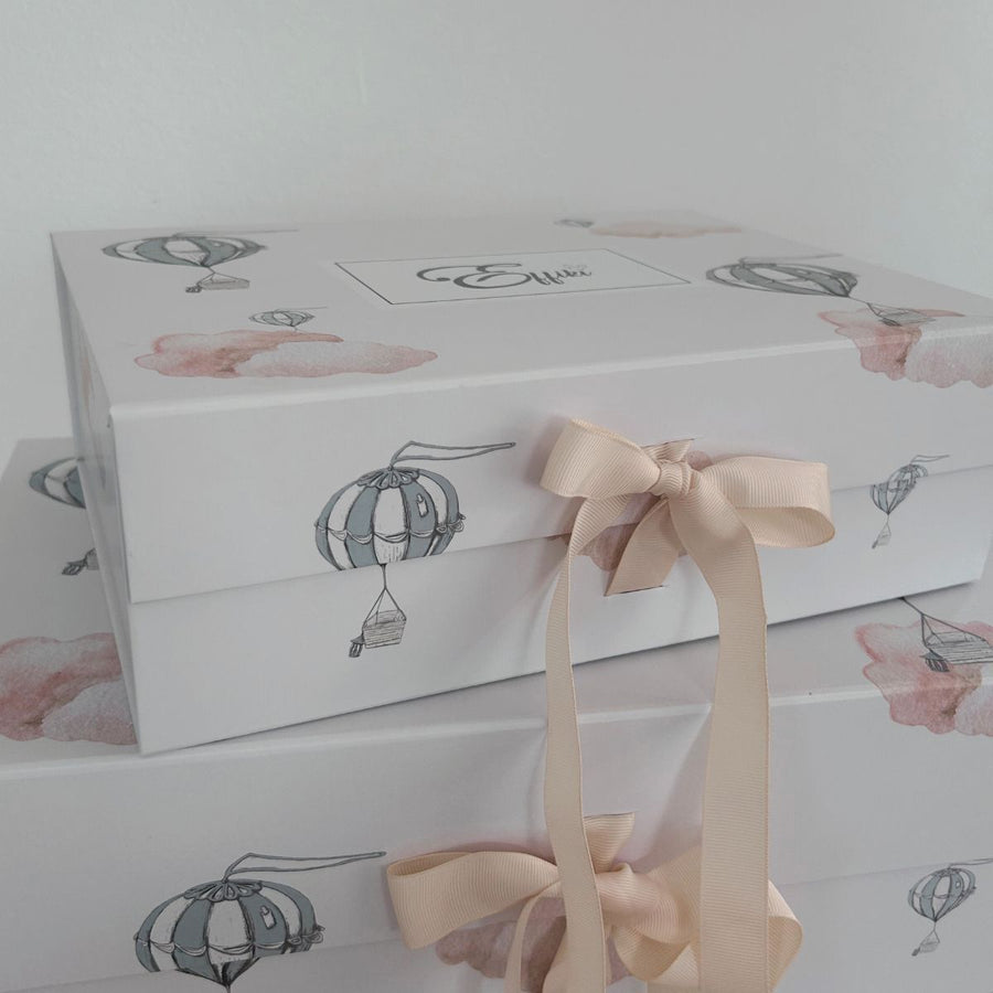 Small and medium baby gift boxes from Effiki in pastel colors